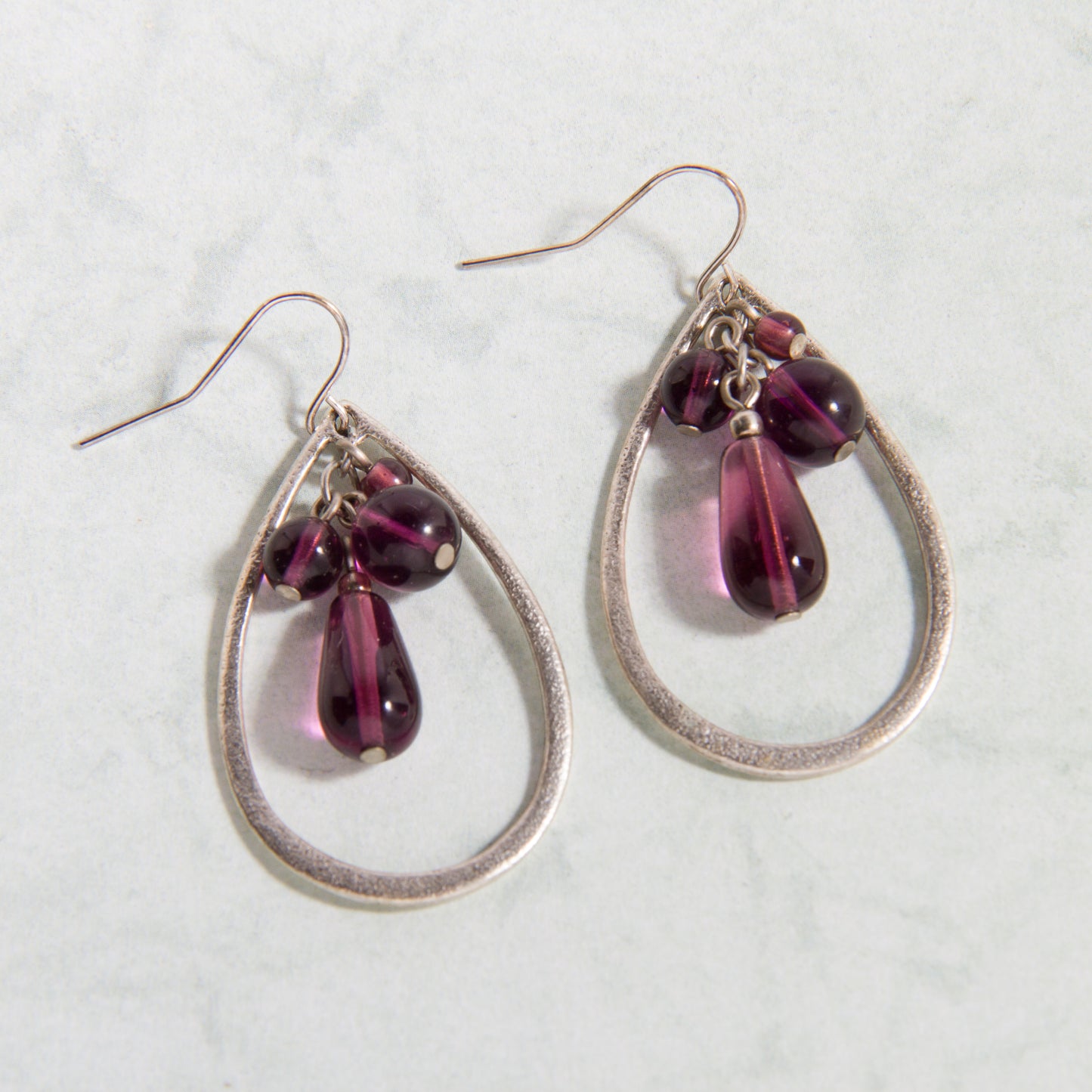 E2171-SL Open Teardrop Earrings with Purple Beads in Antiqued Silver